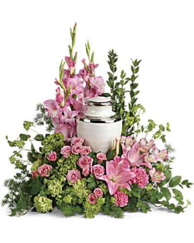 <div class="m-pdp-tabs-description">
<div id="mark-1" class="m-pdp-tabs-marketing-description">Surround the cremation urn with gorgeous, graceful pink blooms that show deep gratitude for a beautiful life.</div>
</div>
<p id="arrngDescp">This pretty arrangement includes miniature green hydrangea, pink spray roses, pink asiatic lilies, pink alstroemeria, pink gladioli, pink carnations, green carnations, bupleurum, green ivy, myrtle, ming fern, and lemon leaf.</p>
Arrangement does not include urn.