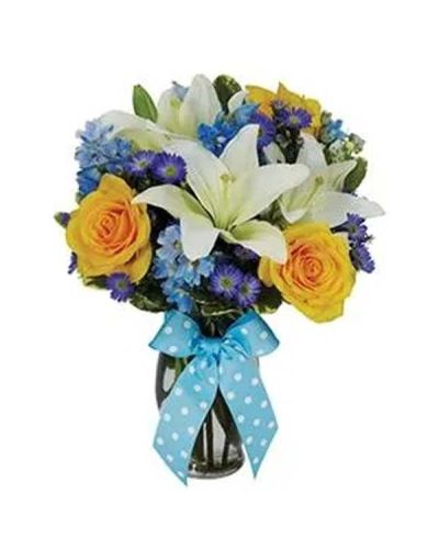 <p>The gorgeous white Asiatic lilies grab your attention right away, but they only begin to tell the story of this uniquely beautiful bouquet also boasting yellow roses, blue delphinium and purple Monte Casino blooms all creatively arranged in a fluted vase with a blue satin ribbon.</p>
