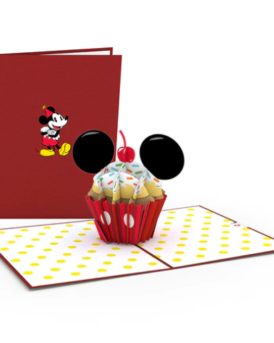 <p>A cheery Disney Mickey Mouse stands with his arms crossed on the red cover of this pop-up card, wearing a party hat. Upon opening, a delicious looking birthday cupcake appears. A red cupcake wrapper, colorful sprinkles, black mouse ears, and a cherry on top -- how cute! The inner panels feature a yellow polka dot pattern, adding to the overall magic and whimsy of this design.</p>
<p>Inspiration for the Mickey Mouse Birthday Cupcake card:<br />
Nothing is more magical than a birthday celebration! We want everyone to have both a sweet and classic way to wish the Disney fans you know a very happy birthday. Three cheers for the Mouseketeer in your life who loves sweet treats!</p>
<p>Occasions for the Mickey Mouse Birthday Cupcake card:<br />
All Disney fans alike will fall for this sugary birthday surprise. Send this pop-up card to your sibling as a nostalgic throwback to when you were kids. No matter the recipient, they're sure to have an extra sweet birthday celebration with this classic design.</p>
<p>Size:<br />
The Disney Mickey Mouse Birthday Cupcake pop-up card is 5 inches wide by 7 inches tall.</p>
<p>Quantity:<br />
One sprinkle-filled Lovepop with one blank envelope and the Lovepop Note, a little note card that slides away with your own personal touch.</p>