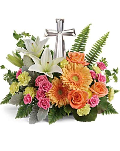 <div id="mark-3" class="m-pdp-tabs-marketing-description">A radiant celebration of faith, this bright bouquet of cheerful orange and pink blooms surrounds a reverent crystal cross keepsake. A precious addition to any special occasion.</div>
&nbsp;
<div id="desc-3">
<ul>
 	<li>Pink spray roses, white asiatic lilies, light orange gerberas, and yellow miniature carnations are accented with bupleurum, dusty miller, galax leaves, sword fern, and leatherleaf fern.</li>
</ul>
</div>