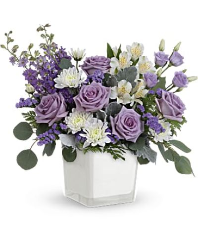 <div id="mark-3" class="m-pdp-tabs-marketing-description">Loveliest lavender! Make any day feel extra special with the soft purple hues of this luxurious rose bouquet, presented in a soft white glass cube.</div>
&nbsp;
<div id="desc-3">Lavender roses, white alstroemeria, lavender lisianthus, lavender larkspur, white cushion spray chrysanthemums and lavender sinuata statice are arranged with dusty miller, leatherleaf fern and silver dollar eucalyptus.</div>
