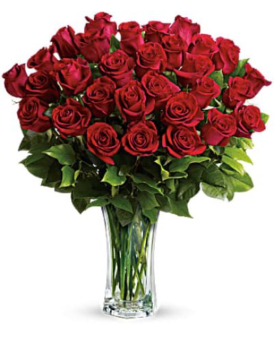 <p>Shout your love from the rooftops with long stemmed red roses artistically arranged in a cut crystal vase. These red roses make a spectacular romantic bouquet. They'll be yours forever.<br />
Standard- 24 Elegant Roses<br />
Deluxe-30 Beautiful Blooms<br />
Premium-36 Exquisite Roses</p>