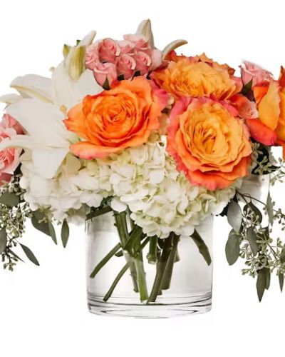 <p>Spontaneous and unconventional. Free Spirit balances strength and gentleness. Hydrangeas are paired with free spirit roses is our clear cylinder vase for this surprisingly stunning mix.</p>