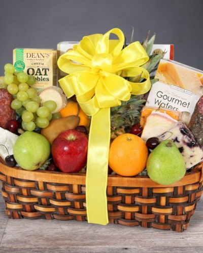 <div id="mark-2" class="m-pdp-tabs-marketing-description">
<hr />
<p style="text-align: right;">The gift of good taste! Send this gourmet gift basket of fruit and snacks to a gracious hostess, busy new parents, or anyone who appreciates the finer things in life.</p>
</div>
<div class="m-pdp-tabs-marketing-description" style="text-align: right;">This wonderful basket overflows with delicious fruit and tasty treats.</div>
<div id="desc-2">
<ul>
<li style="text-align: right;">Apples, pears, oranges, grapes, bananas and a pineapple are presented with cheeses, crackers, tea and other savory snacks in a natural gift basket that's trimmed with a bow.</li>
</ul>
</div>
