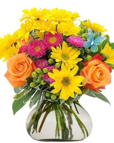 Sweet and tangy. Lemon Lift will brighten your space with a mix of bright, cheerful flowers like daisies, roses, and berries, accented with a butterfly.

Approximately 9"W X 9"H