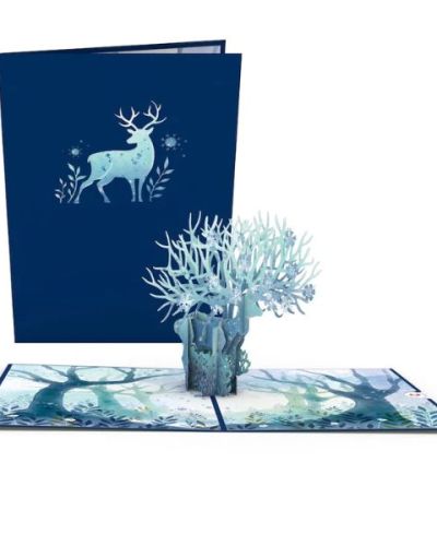 <p>This pop-up card has a cobalt blue front cover that showcases a stunning illustration of a white and blue deer surrounded by snowflakes and leaves blowing in the wind. When you open the card, the deer emerges in 3D, its antlers multiplying and reaching out like branches of a grand tree. The deer is colored in various shades of blue and white. Delicate snowflakes hide between the deer's antlers, adding sparkle and whimsy to their stance. The inside cover features beautiful drawings of trees and leaves, with dark and light colors to create an air of mystery.</p>
<p>Embrace the magic of wintertime with the Winter Surreal Deer 3D greeting card. With a woodland design and frosty colors, this card can appeal to anyone who loves the chilly season. Send this unique greeting card to a friend or family member to let them know you're excited about winter this year!</p>
<p>&nbsp;</p>
<p>Size:<br />
Each Winter Surreal Deer Pop-Up Card is 5 inches wide by 7 inches tall.</p>
<p>Quantity:<br />
One Lovepop with one blank envelope and the Lovepop Note, a little note card that slides away with your own personal touch.</p>
