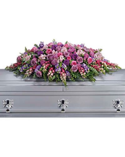 <div id="mark-1" class="m-pdp-tabs-marketing-description">Honor her femininity and generous spirit with a blanket of sweetly scented lavender, pink and purple flowers that create a magnificent final tribute, sincerely expressing devotion and love.</div>
<div id="desc-1">
<ul>
 	<li>Gorgeous flowers such as lavender and pink roses, pink snapdragons and alstroemeria, purple and lavender chrysanthemums. All are entwined with eucalyptus, huckleberry and ming fern.</li>
</ul>
</div>